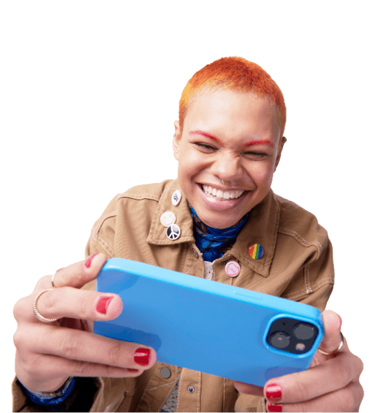 Woman smiling looking at mobile phone