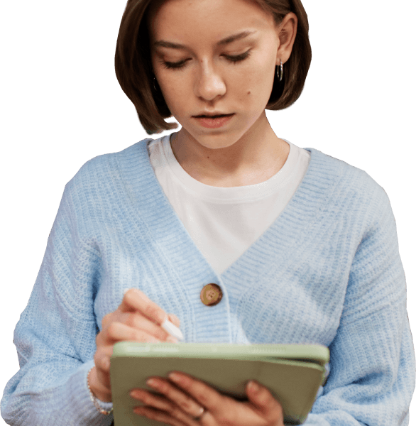 A woman pointing a stylus at the screen of her handheld tablet device